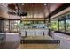 Enjoy the convenience of this outdoor kitchen with a bar and grill setup at 13450 E Lake Mary Jane Rd, Orlando, FL 32832