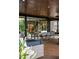 Relax on the open-air covered patio, perfect for outdoor dining and entertaining at 13450 E Lake Mary Jane Rd, Orlando, FL 32832
