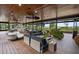 Expansive covered outdoor living area with comfortable seating and stunning views at 13450 E Lake Mary Jane Rd, Orlando, FL 32832
