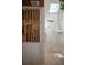 Spa-like shower with bamboo accents, rain shower head, and marble tiling at 13450 E Lake Mary Jane Rd, Orlando, FL 32832