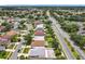 Scenic aerial view of the property, highlighting its convenient location near roads, and surrounding community at 1437 Abberton Dr, Orlando, FL 32837