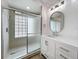Bathroom features a glass enclosed shower, vanity, and modern lighting at 1437 Abberton Dr, Orlando, FL 32837