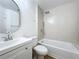 Bright bathroom features a modern vanity and tile tub-shower combination at 1437 Abberton Dr, Orlando, FL 32837