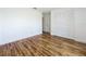 A bedroom featuring wood-look floors and a closet at 1437 Abberton Dr, Orlando, FL 32837