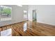 Bright bedroom boasts glossy wood floors and lots of natural light from windows at 1437 Abberton Dr, Orlando, FL 32837