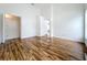 Bright bedroom boasts glossy wood floors and large walk-in closet at 1437 Abberton Dr, Orlando, FL 32837