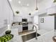 Modern kitchen featuring white cabinets, stainless steel appliances, sleek countertops, and recessed lighting at 1437 Abberton Dr, Orlando, FL 32837