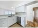 Modern kitchen featuring white cabinets, quartz countertops, and stainless steel appliances at 1437 Abberton Dr, Orlando, FL 32837