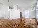 Bright living room featuring high ceilings, hardwood floors, and ample natural light at 1437 Abberton Dr, Orlando, FL 32837