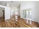 Spacious living area featuring hardwood floors, high ceilings, and neutral paint at 1437 Abberton Dr, Orlando, FL 32837