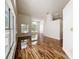 Spacious living room featuring hardwood floors, large windows, high ceilings, and natural light at 1437 Abberton Dr, Orlando, FL 32837