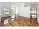 Bright living room featuring hardwood floors, large windows, high ceilings, and natural light at 1437 Abberton Dr, Orlando, FL 32837