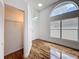 Bright living space featuring hardwood floors, closet, and neutral paint at 1437 Abberton Dr, Orlando, FL 32837