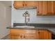 Kitchen with wood cabinets and a gray countertop at 815 E Church St, Bartow, FL 33830