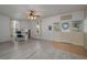 Living room featuring wood-look floors and an office area at 815 E Church St, Bartow, FL 33830