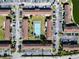 Directly above view of apartment community with tennis court at 1920 E Edgewood Dr # A4, Lakeland, FL 33803