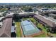 Aerial view of community tennis courts at 1920 E Edgewood Dr # A4, Lakeland, FL 33803