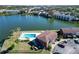 Community pool and lakefront view at 1920 E Edgewood Dr # A4, Lakeland, FL 33803