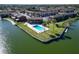 Aerial view of community pool and lake at 1920 E Edgewood Dr # A4, Lakeland, FL 33803