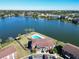 Community features pool, lake, and tennis courts at 1920 E Edgewood Dr # A4, Lakeland, FL 33803