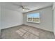 Well-lit bedroom with ceiling fan and window with blinds at 1920 E Edgewood Dr # A4, Lakeland, FL 33803