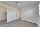 Spacious bedroom with double closets and grey carpet at 1920 E Edgewood Dr # A4, Lakeland, FL 33803