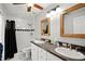 Bathroom with double vanity and shower/tub combo at 2375 Miles Ct, Lakeland, FL 33812