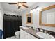 Bathroom with double vanity and shower/tub combo at 2375 Miles Ct, Lakeland, FL 33812