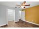 Bedroom with walk-in closet and wood flooring at 2375 Miles Ct, Lakeland, FL 33812