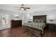 Spacious bedroom with wood flooring and a large bed at 2375 Miles Ct, Lakeland, FL 33812