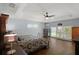 Bright bedroom with wood floors and backyard view at 2375 Miles Ct, Lakeland, FL 33812