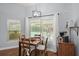 Cozy dining area with wood flooring and pool view at 2375 Miles Ct, Lakeland, FL 33812