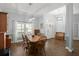 Light and airy dining room with wood table and chairs at 2375 Miles Ct, Lakeland, FL 33812