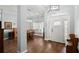 Bright entryway with hardwood floors and stained glass door at 2375 Miles Ct, Lakeland, FL 33812