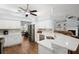 Updated kitchen featuring white cabinets and a large island at 2375 Miles Ct, Lakeland, FL 33812