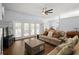 Living room with hardwood floors and French doors at 2375 Miles Ct, Lakeland, FL 33812