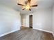 Spacious bedroom with ceiling fan and large closet at 4201 Shadow Wood Dr, Winter Haven, FL 33880