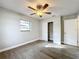 Bedroom with closet and wood-look floors at 4201 Shadow Wood Dr, Winter Haven, FL 33880