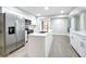 Modern kitchen with stainless steel appliances and white cabinets at 4201 Shadow Wood Dr, Winter Haven, FL 33880