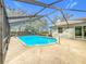 Refreshing screened pool perfect for relaxation at 4201 Shadow Wood Dr, Winter Haven, FL 33880