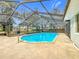 Inviting screened pool with a large patio area at 4201 Shadow Wood Dr, Winter Haven, FL 33880