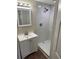 Clean bathroom with a shower/tub combo and white vanity at 503 Se 3Rd St, Mulberry, FL 33860