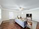 Spacious living room featuring hardwood floors and a ceiling fan at 503 Se 3Rd St, Mulberry, FL 33860