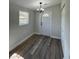 Charming dining area with vinyl flooring and a chandelier at 7612 Glen Meadow Dr, Lakeland, FL 33810