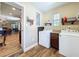 Laundry room featuring a washer, dryer, and plenty of storage space at 1025 E Georgia St, Bartow, FL 33830