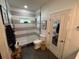 Modern bathroom featuring a glass shower, neutral-toned tiling, and sleek fixtures at 121 Belmont Dr, Winter Haven, FL 33884