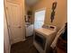 Neat laundry room featuring new appliances and lots of light at 121 Belmont Dr, Winter Haven, FL 33884