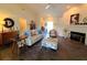 Bright living room showcasing high ceilings, dark wood floors, and an open floor plan leading to other areas at 121 Belmont Dr, Winter Haven, FL 33884