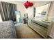 Spacious bedroom with dresser and large mirror at 187 Brooke'S Pl, Haines City, FL 33844