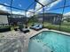 Enjoy this refreshing pool and patio with lounge chairs at 187 Brooke'S Pl, Haines City, FL 33844